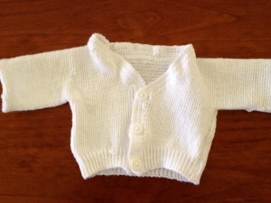 Knitted with Double Knitting Lincraft yarn in white with a crochet neckline